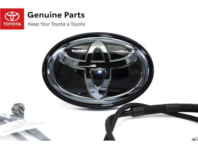 Toyota PT413-89250 Illuminated Front Emblem: Dark Chrome PT413-89250 Toyota Illuminated Front Emblem: Dark Chrome Product Photo 1 of 1